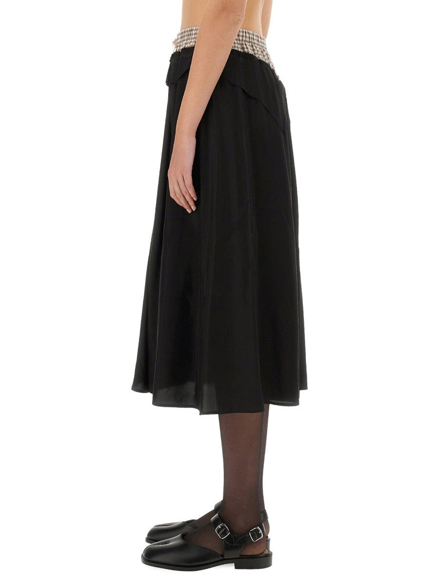 "ANONYMITY OF THE LINING" SKIRT