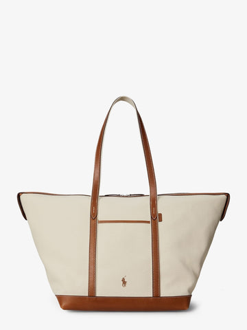 Canvas travel bag with leather profiles