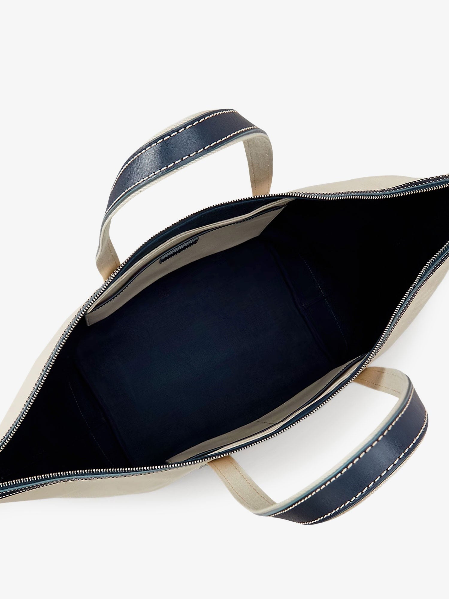 Canvas travel bag with leather profiles