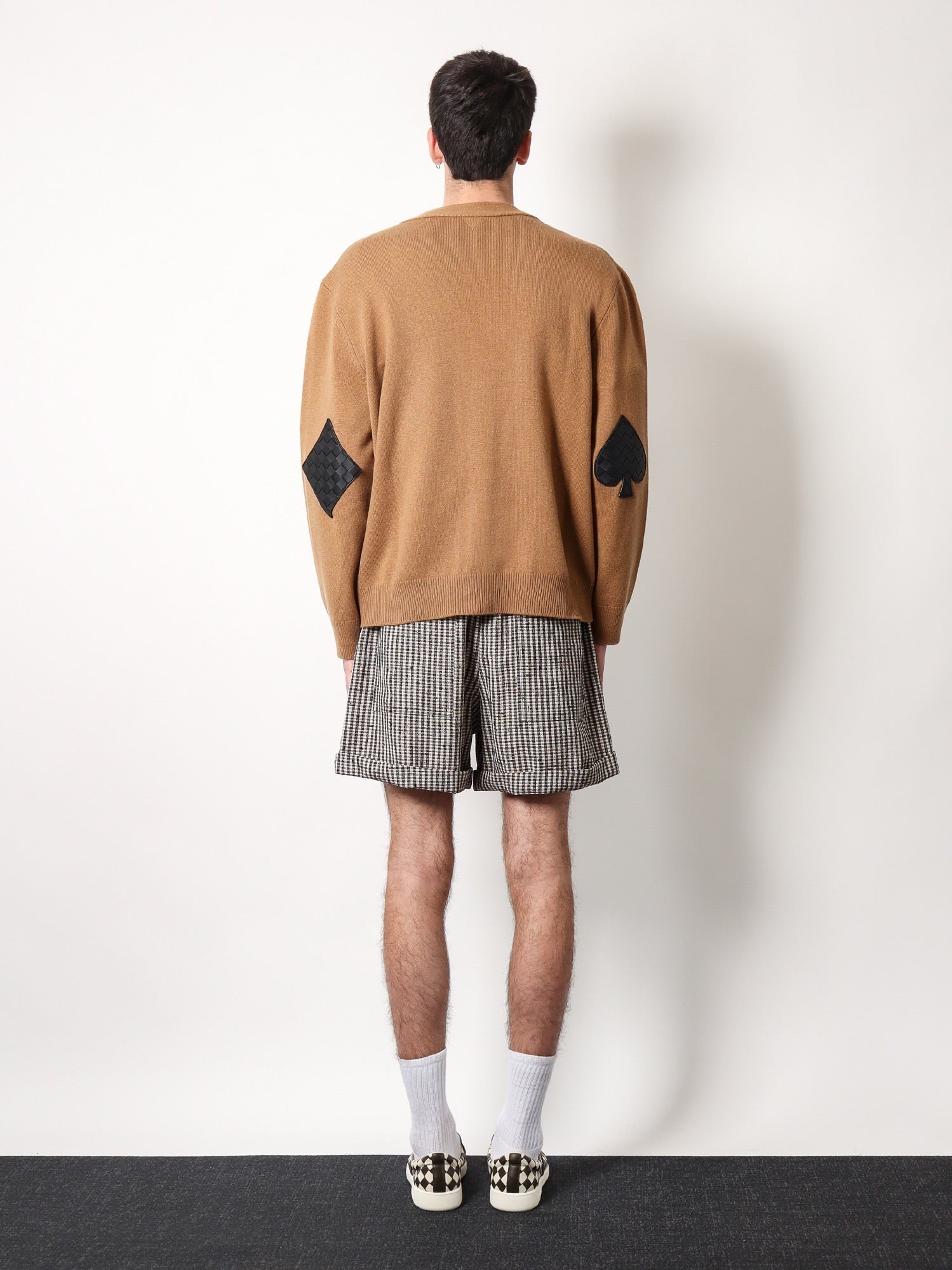 Cashmere cardigan with intrecciato iconic motif leather  details