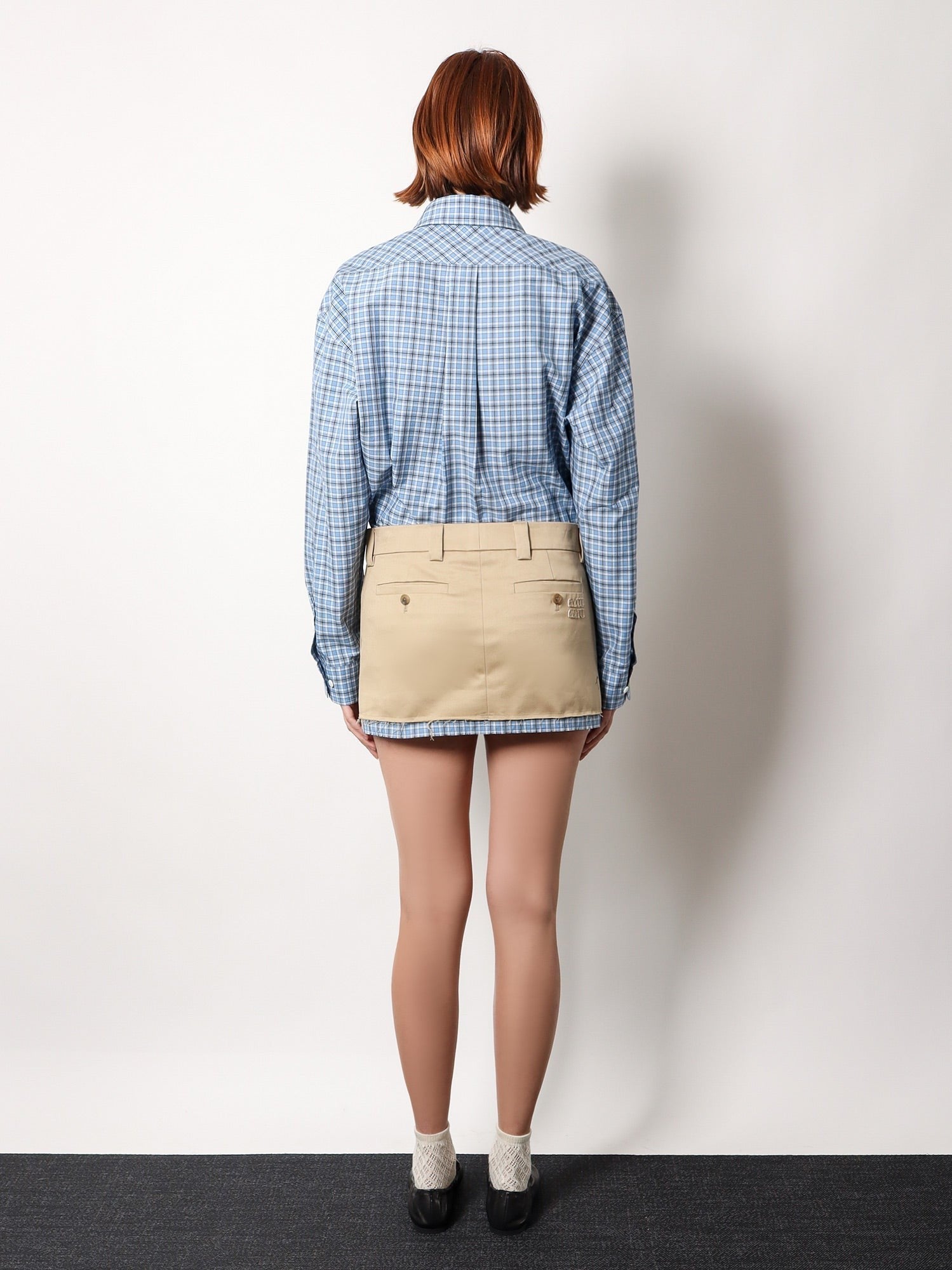 Cotton skirt with check insert on the bottom