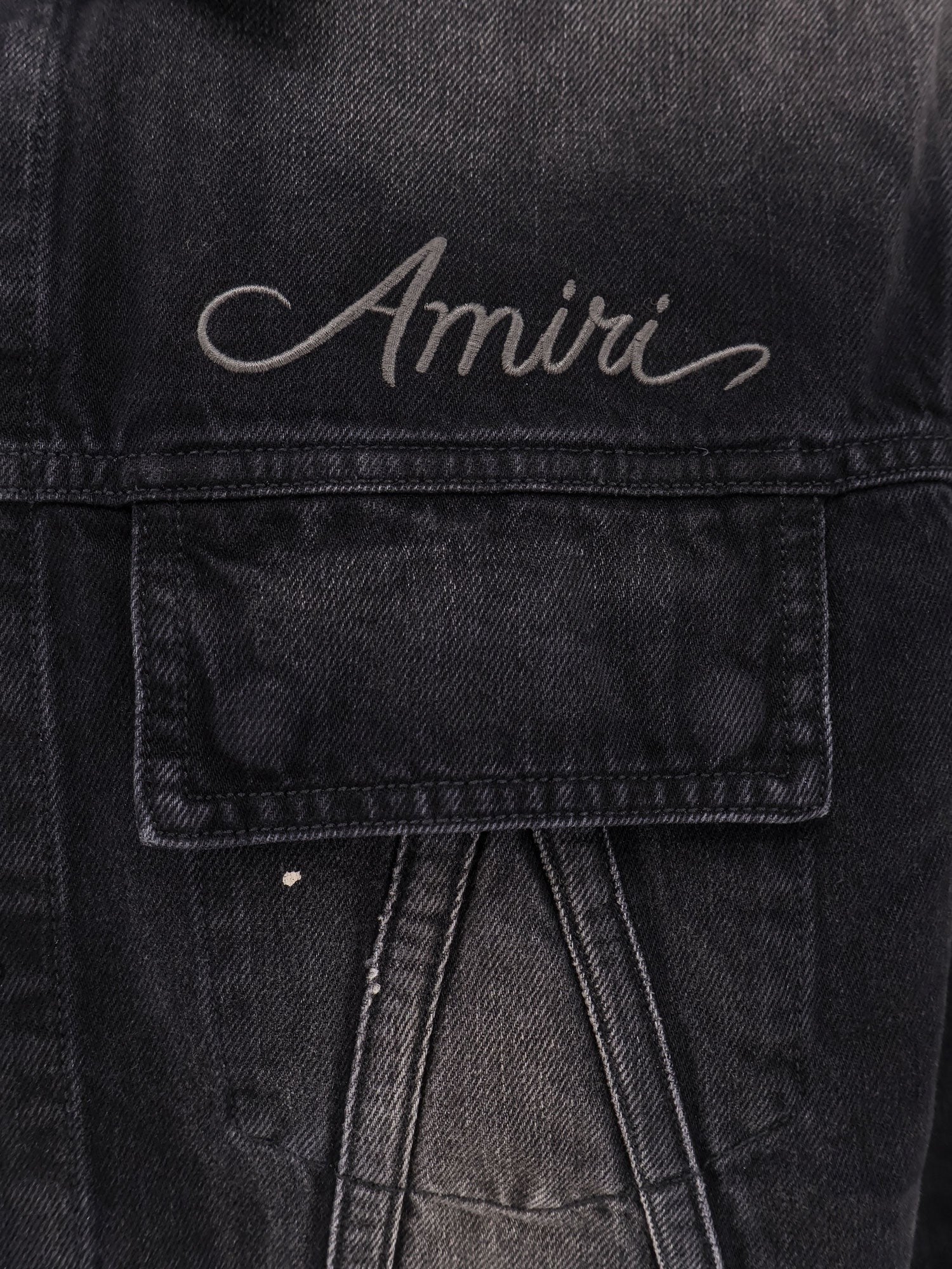 Denim jacket with embroidered logo on the front