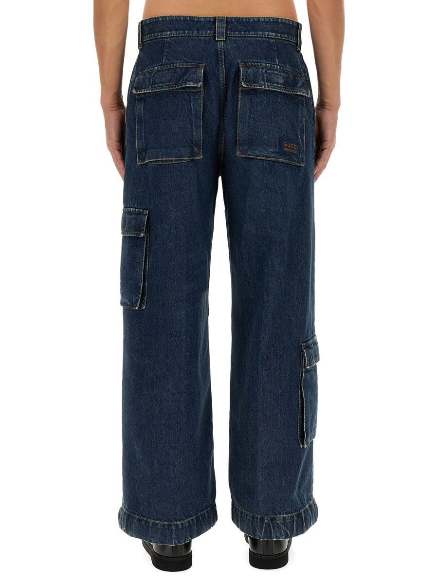 DENIM PANTS WITH GUCCI LABEL