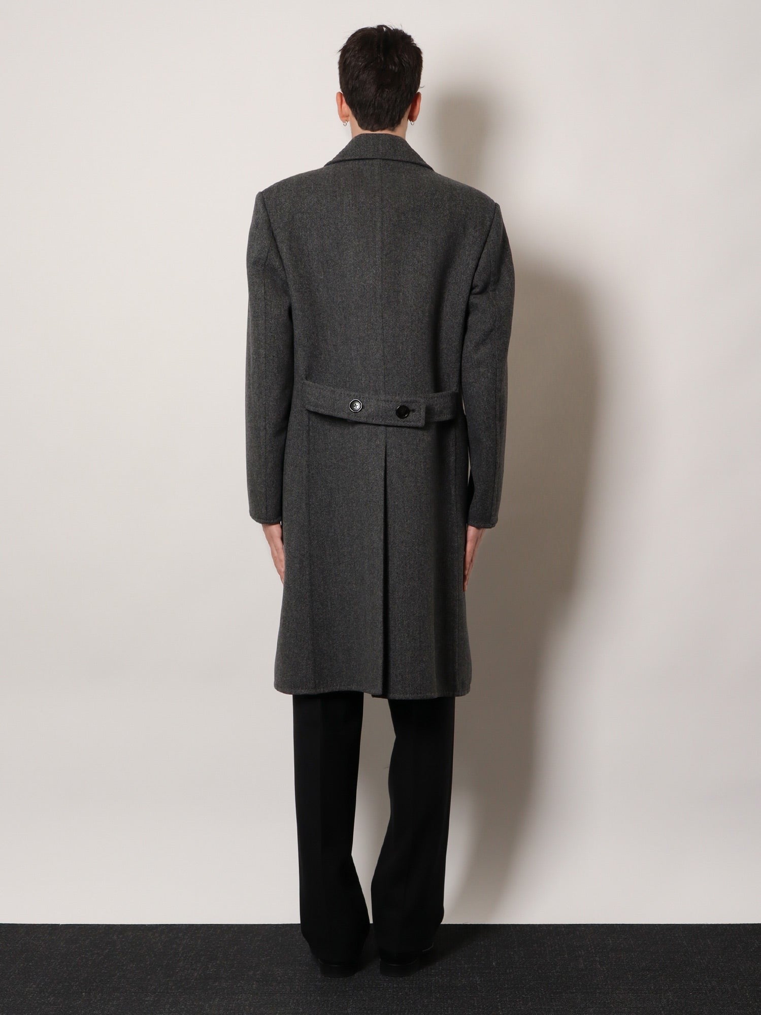 Double-breasted wool coat with herringbone motif