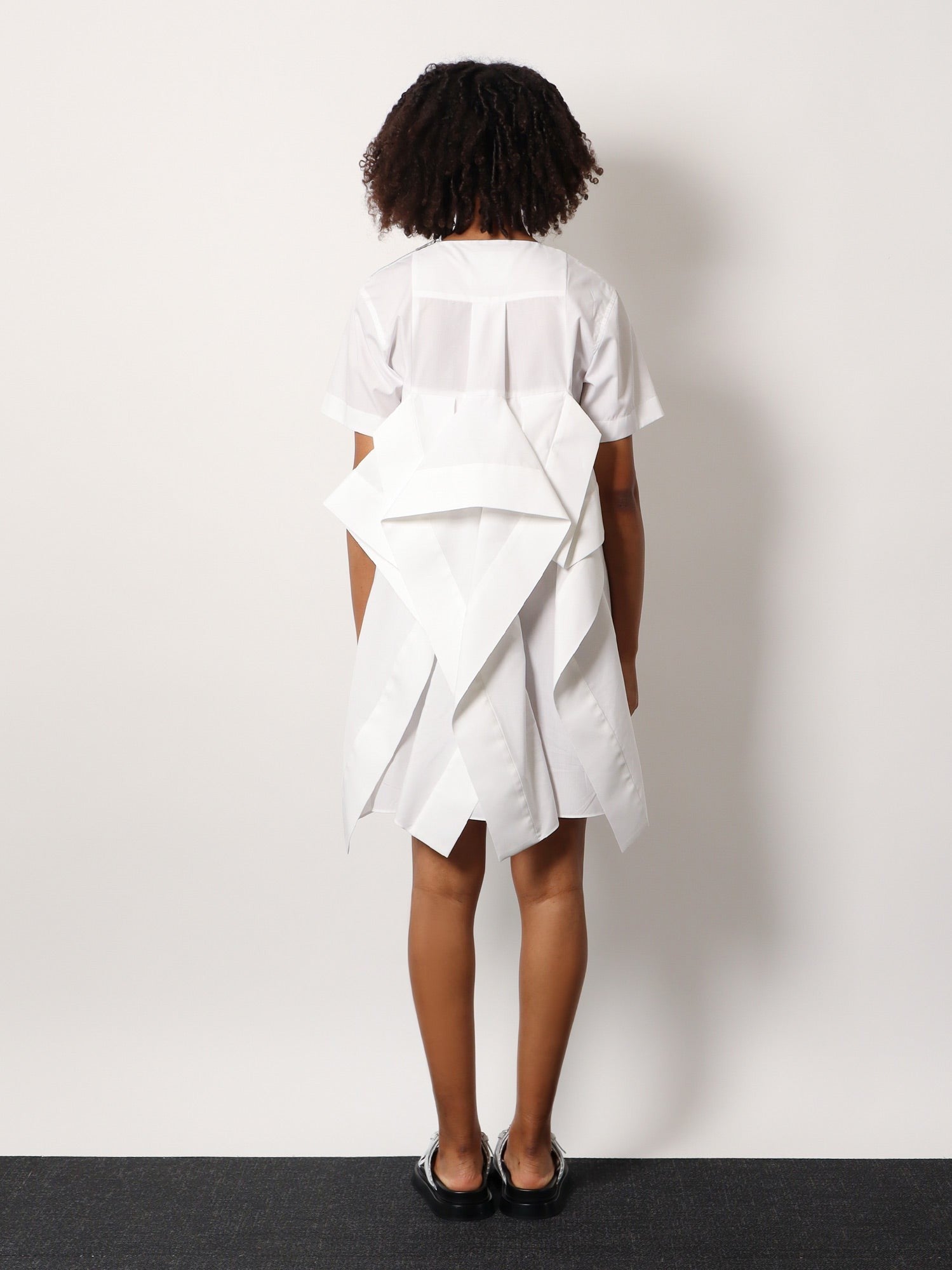 Dress with draped cotton inserts on the back