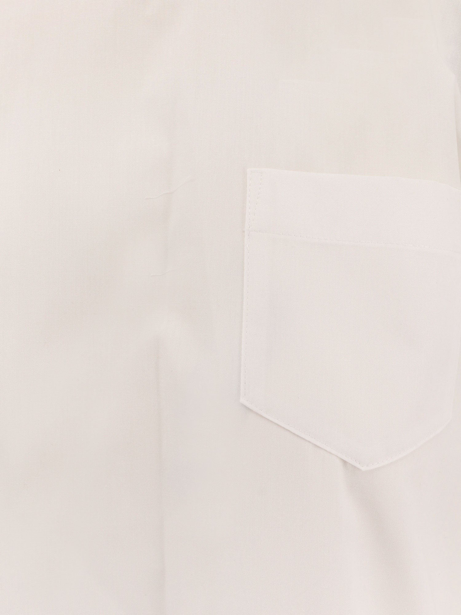 Dress with draped cotton inserts on the back