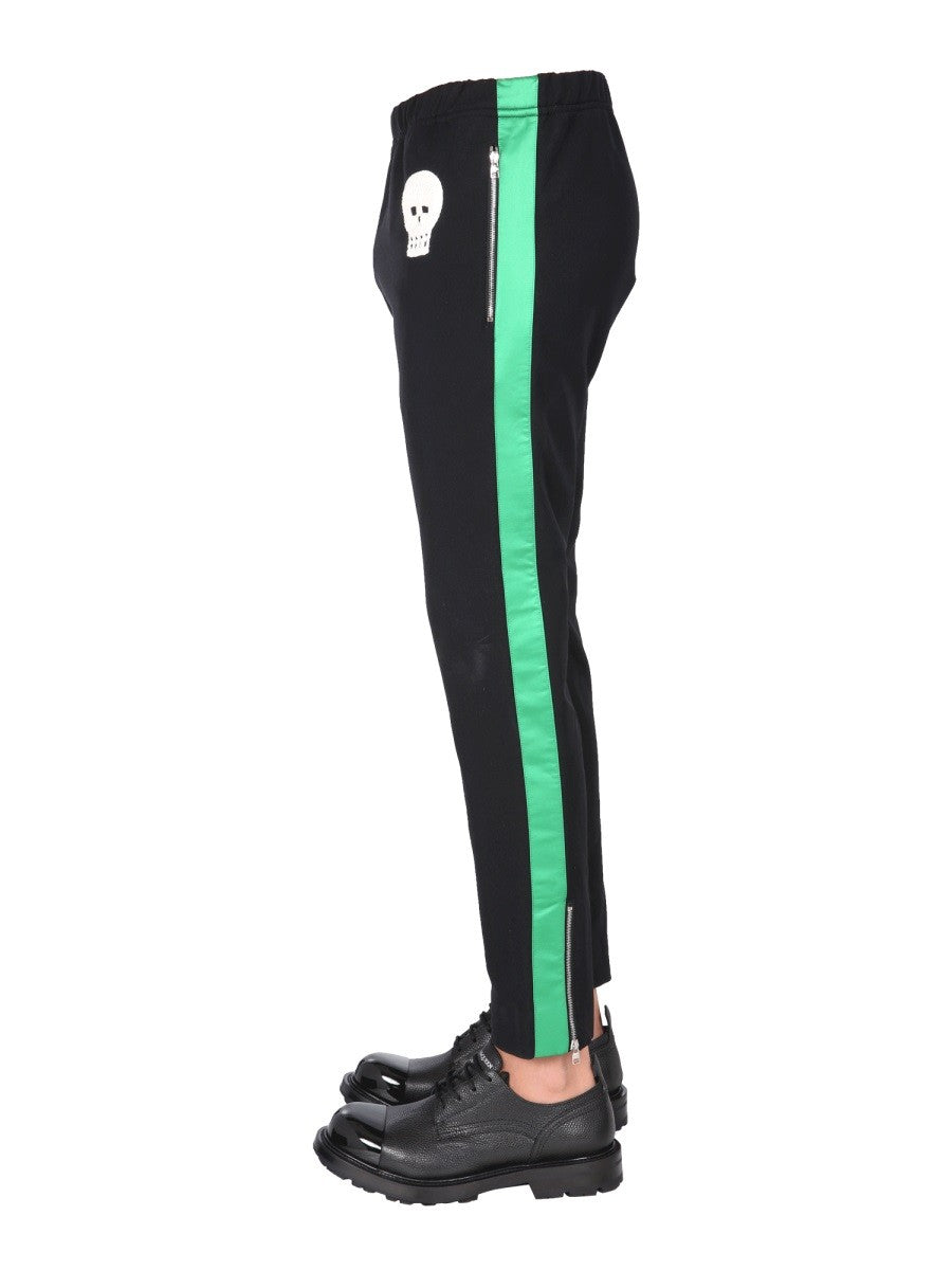 JOGGING PANTS WITH EMBROIDERED SKULL