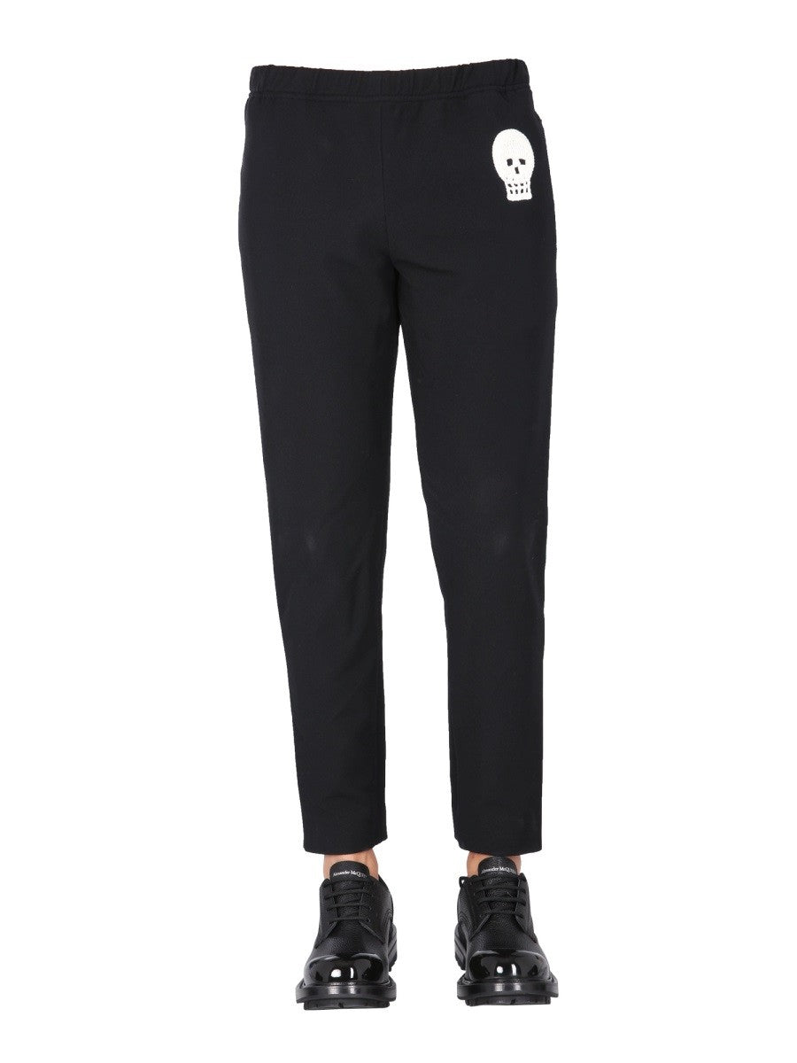 JOGGING PANTS WITH EMBROIDERED SKULL