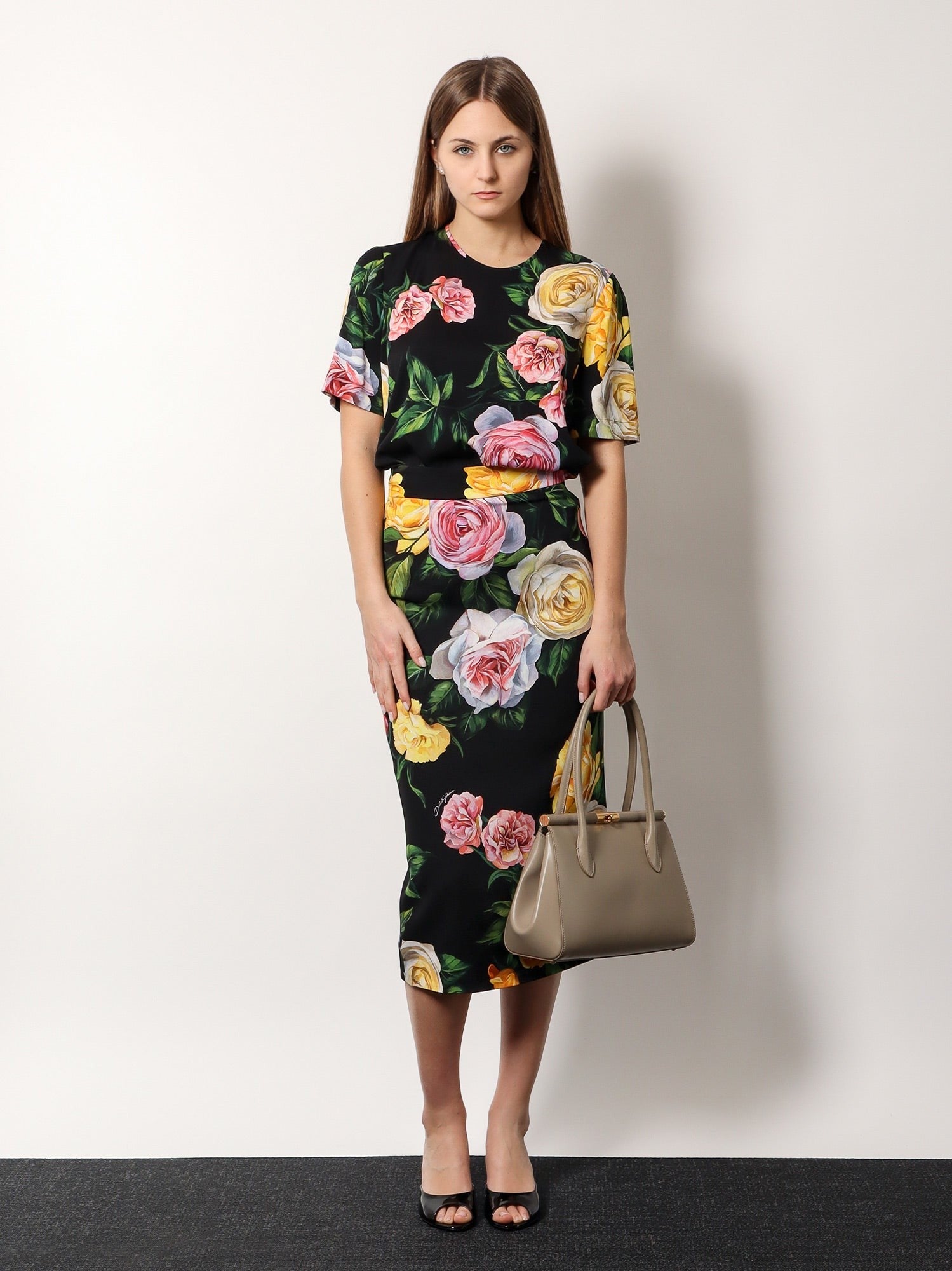 Marlene leather handbag with charm detail on the front