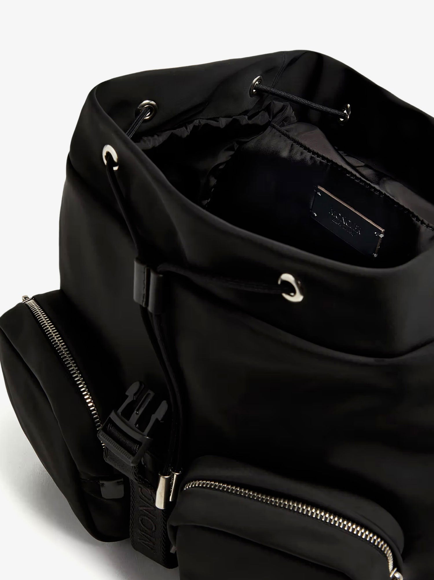 Nylon backpack with leather inserts