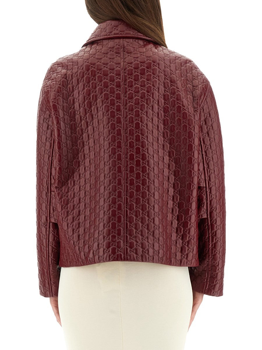 OVERSIZED LEATHER JACKET WITH EMBOSSED GG