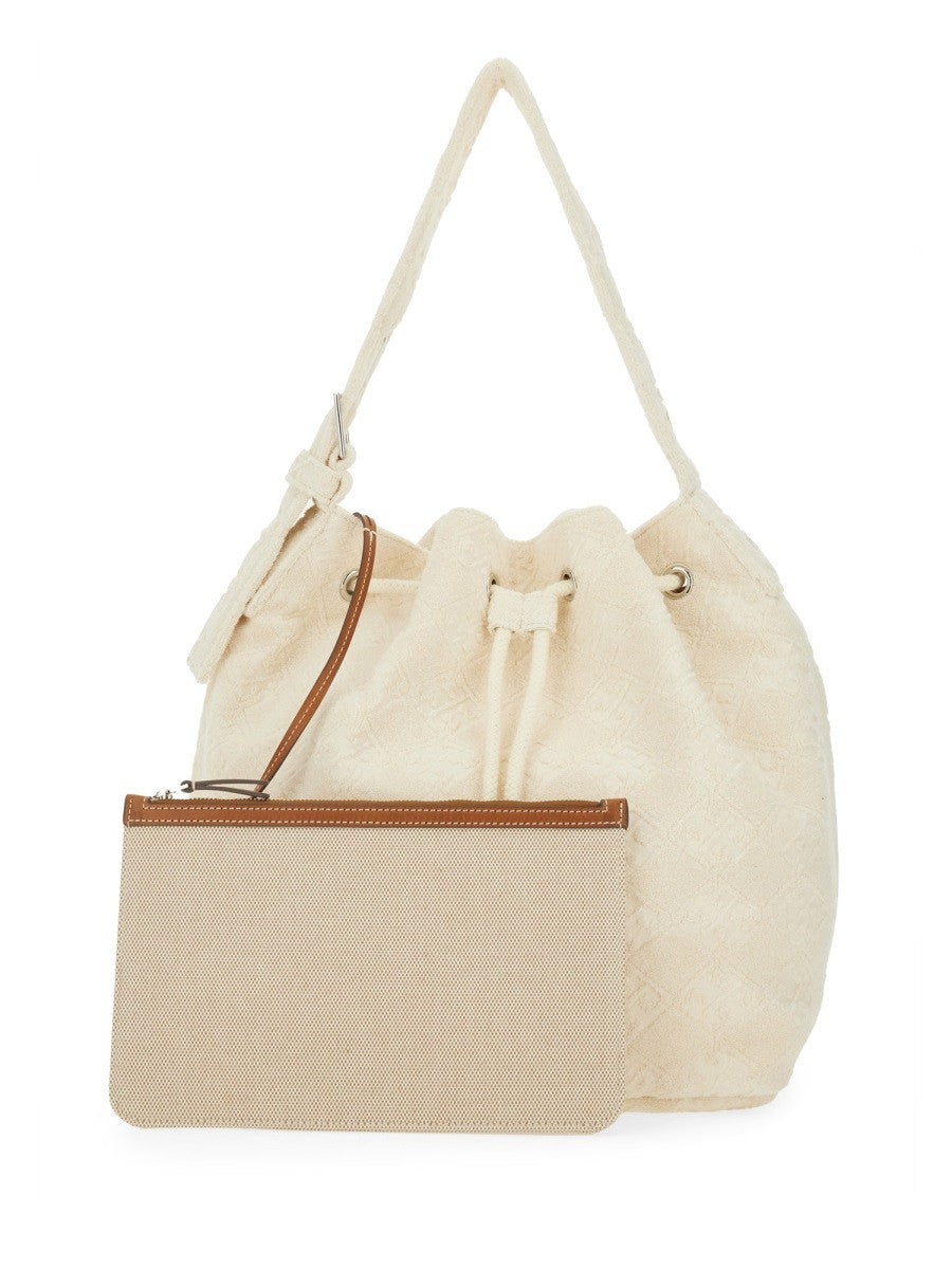 OVERSIZED "T MONOGRAM" BUCKET BAG