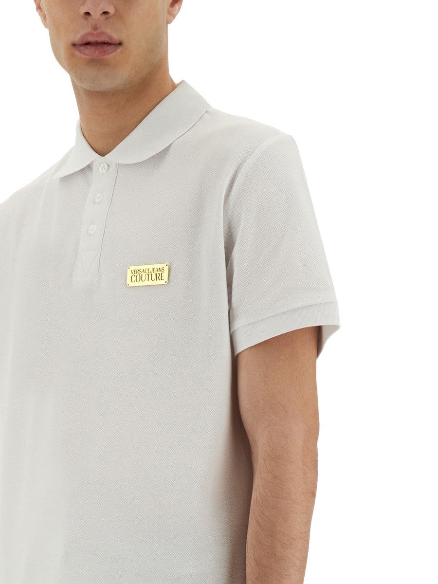 POLO SHIRT WITH LOGO PLAQUE
