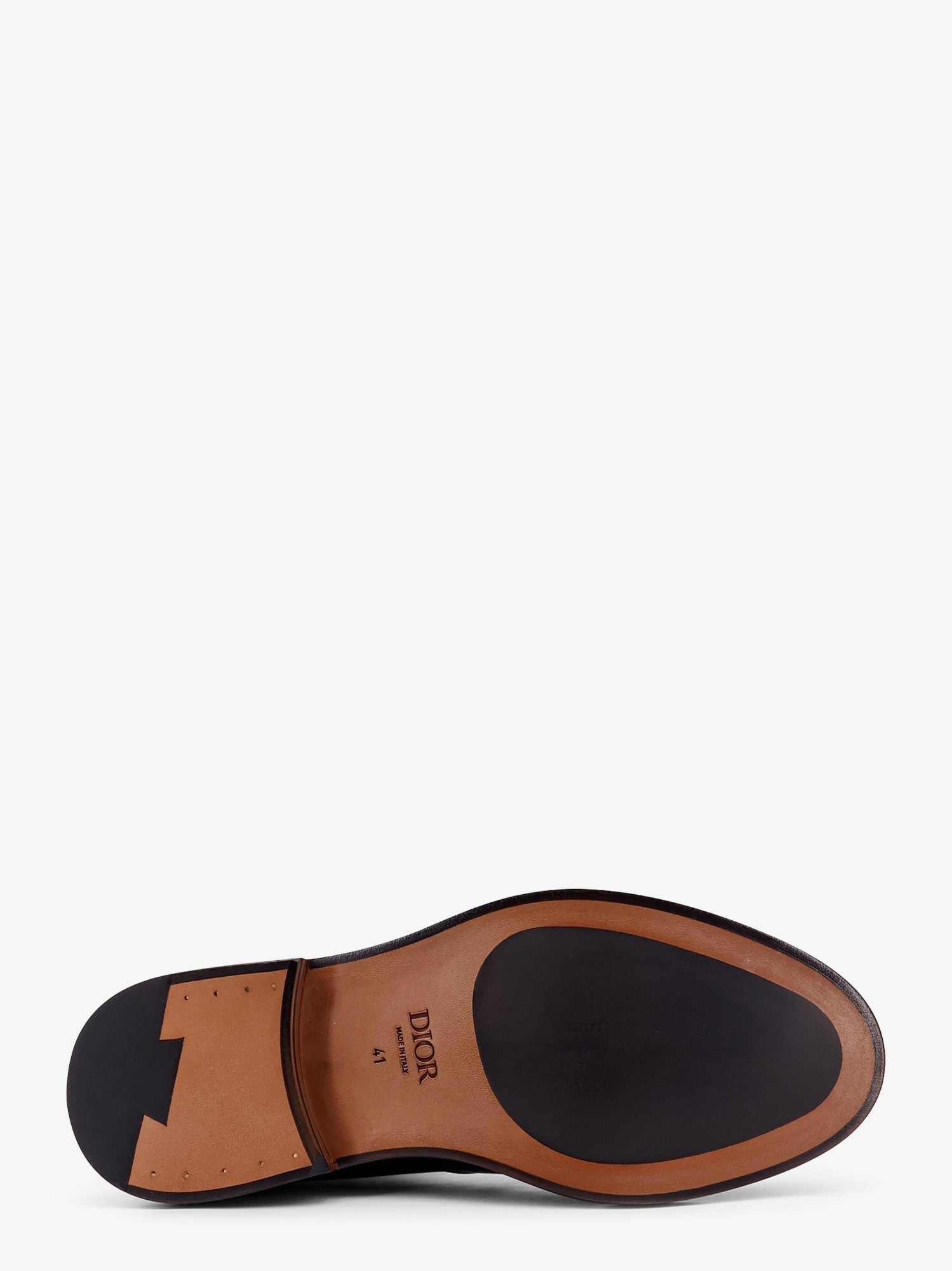 Shiny leather boots with engraved logo on the side