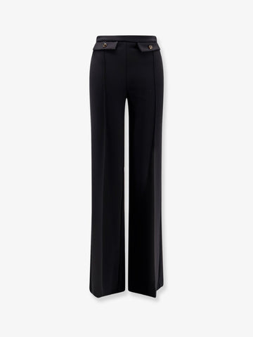 Trousers with double logoed button