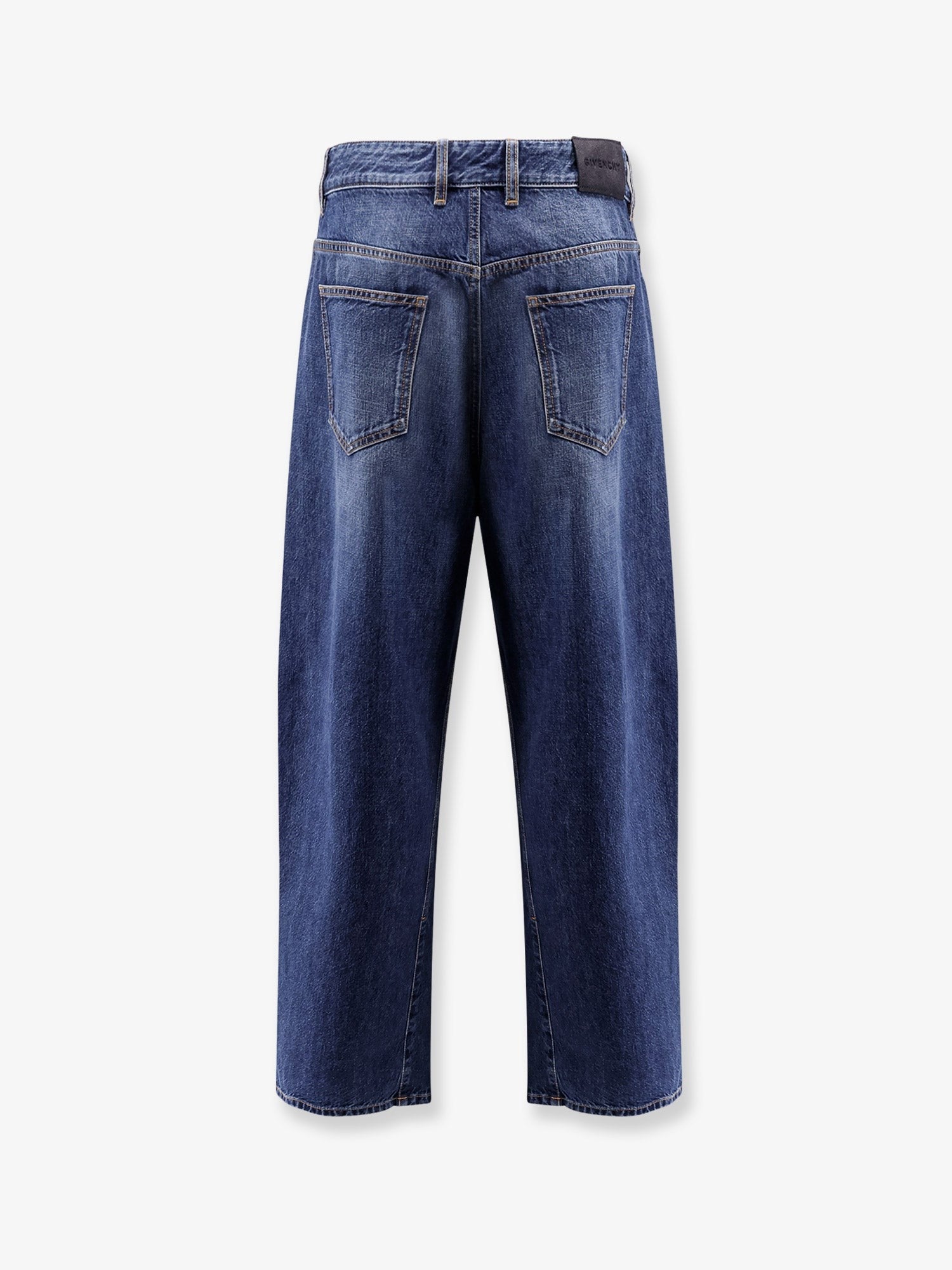 Twisted stone-washed denim jeans