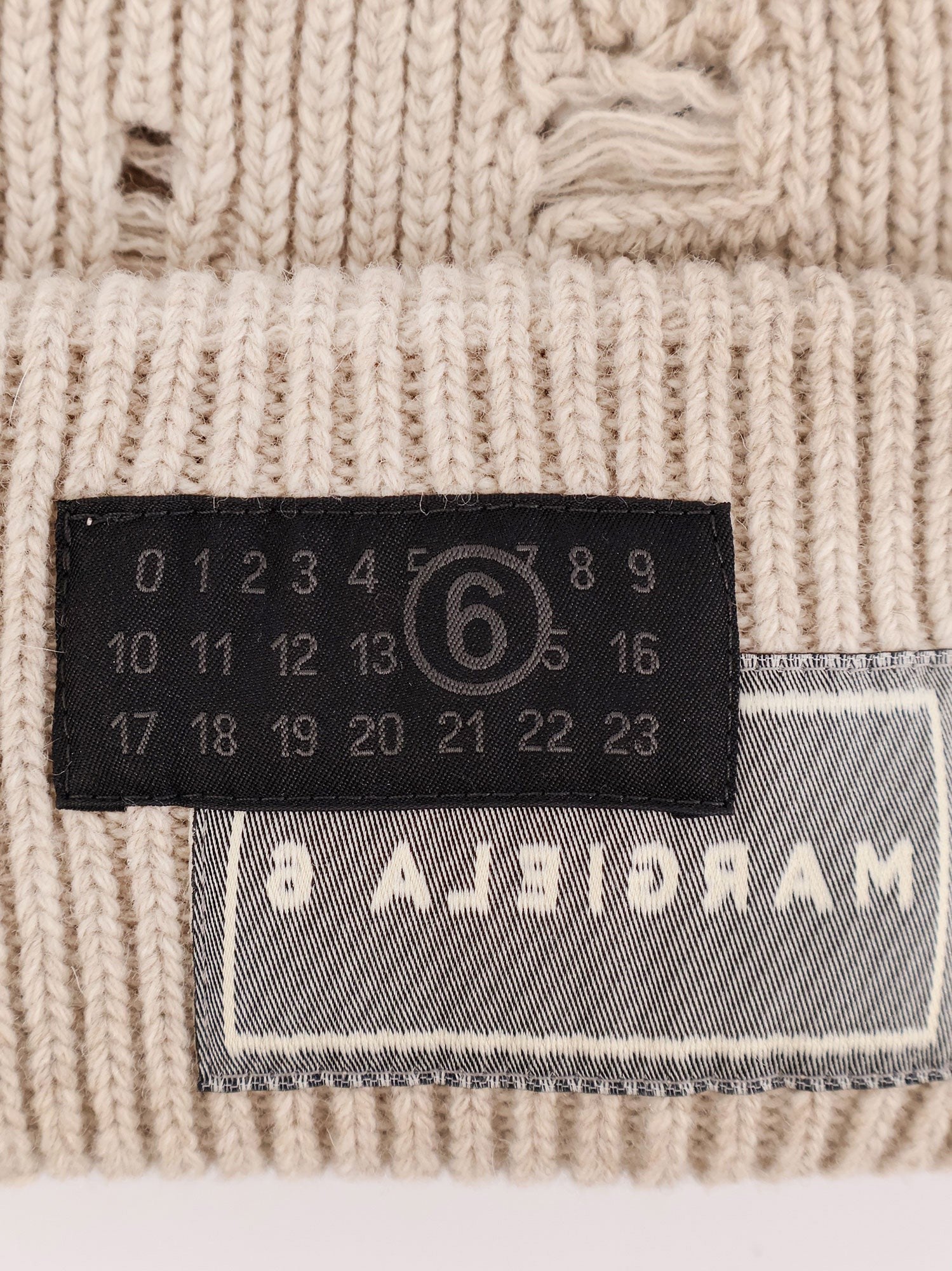 Wool blend beanie hat with distressed effect