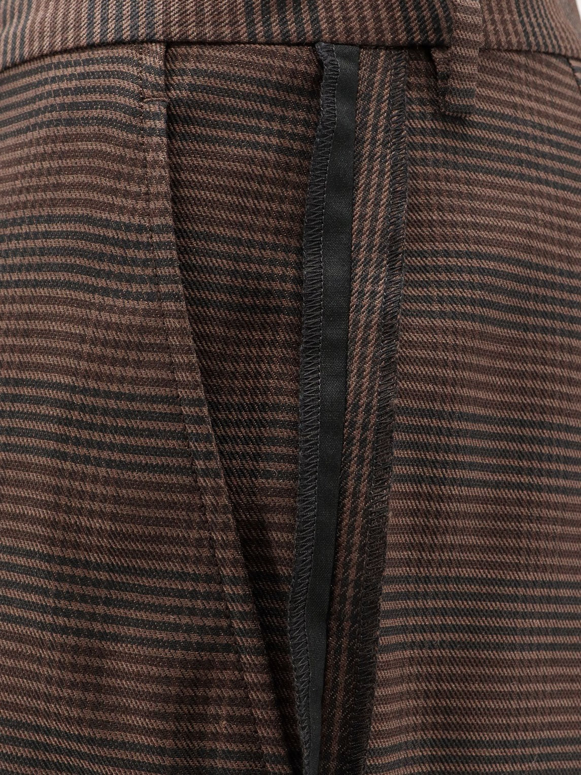 Wool blend trousers with raw-cut edges