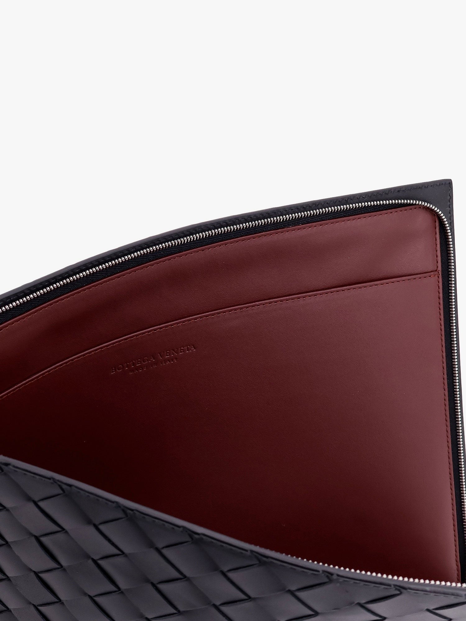 Woven leather pochette