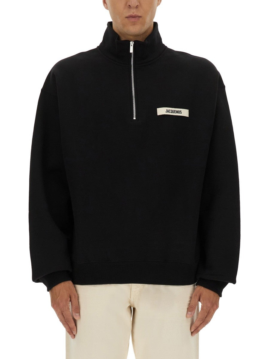 ZIPPERED TURTLENECK SWEATSHIRT