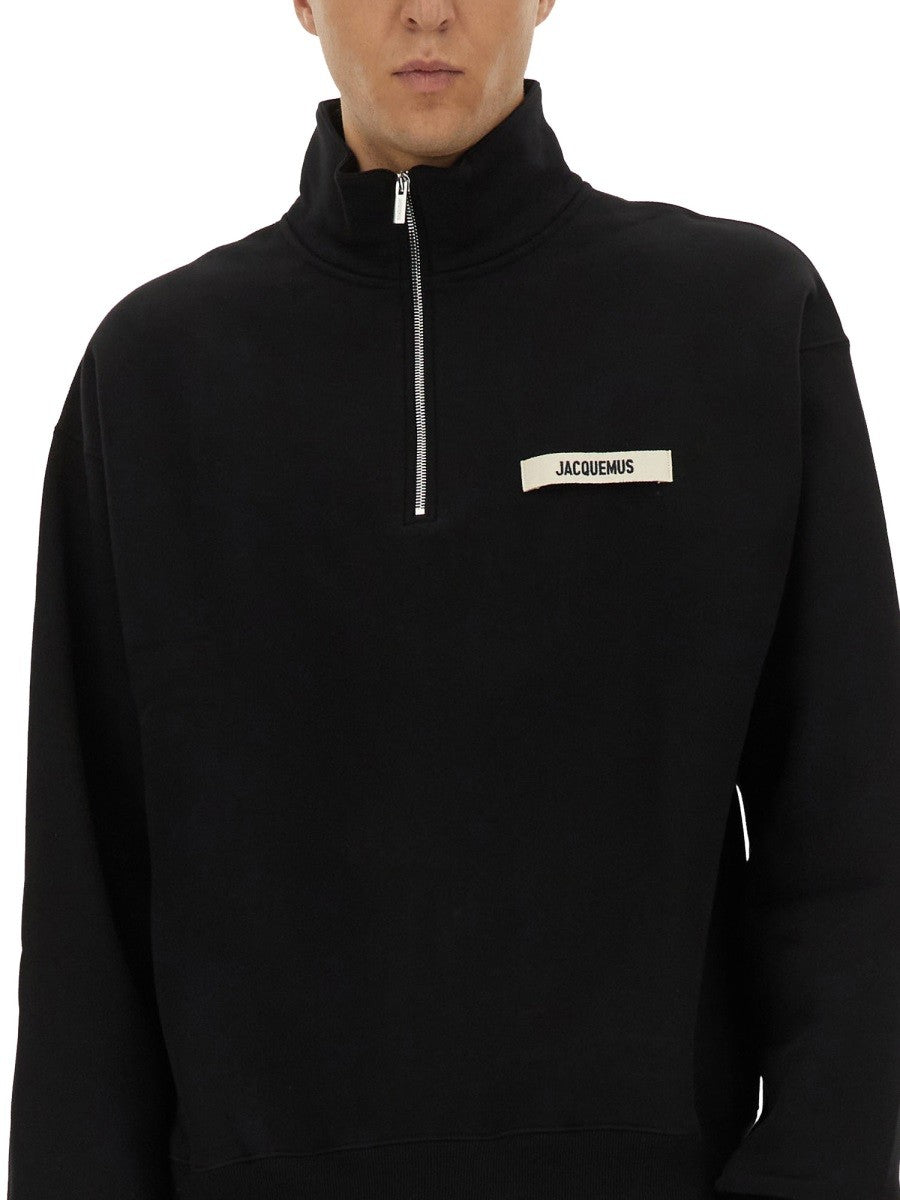 ZIPPERED TURTLENECK SWEATSHIRT