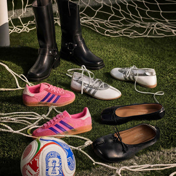 Soccer jersey outfit shoe options for World Cup 2026 including Adidas sneakers, ballet flats and leather boots on a football pitch