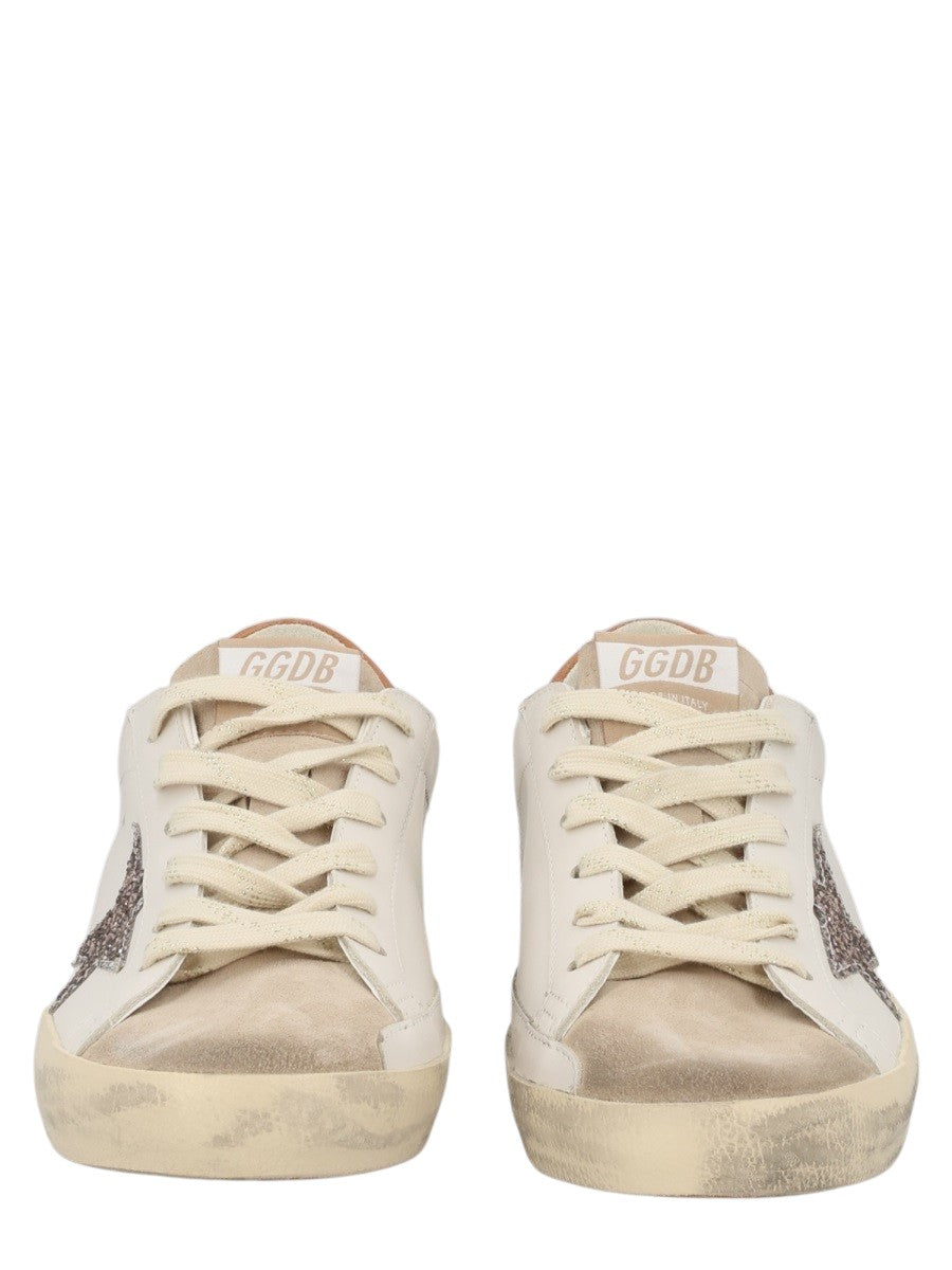 Golden Goose - SNEAKER "SUPER-STAR" Golden-Goose-Super-Star-sneakers-shown-from-the-front-in-white-leather-with-ice-gray-suede-toes-and-cream-laces