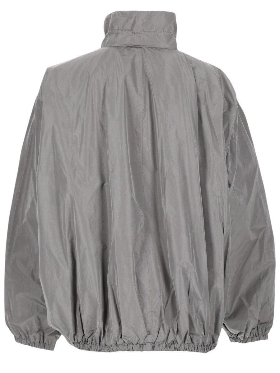Alexander Wang women's gray technical jacket with high neck and relaxed fit – back view.