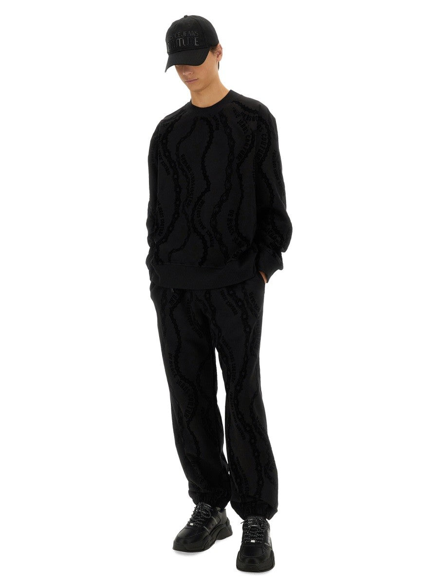 Versace Jeans Couture - ALL OVER "CHAIN" JOGGING PANTS all-over-chain-jogging-pants_2c3a7354-451a-4d97-a1df-acfdf1cf090f