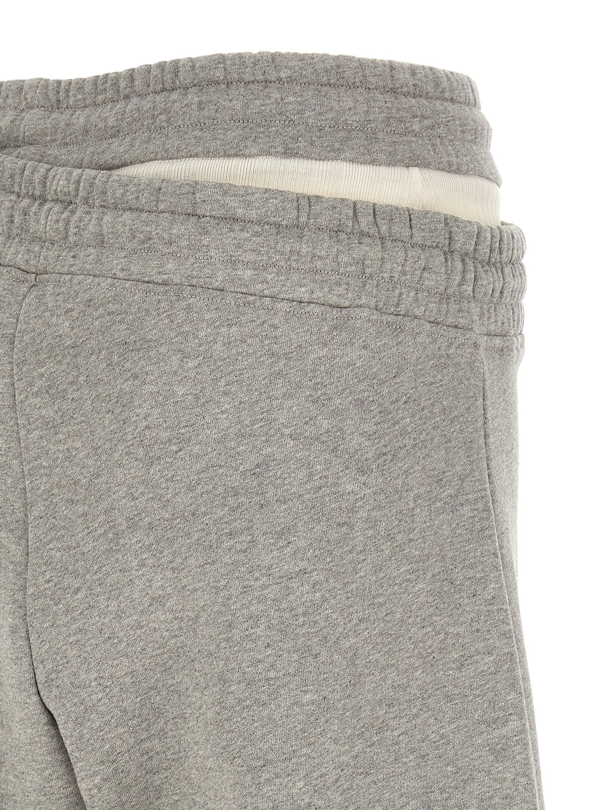 The Attico - Asymmetrical double waist trousers