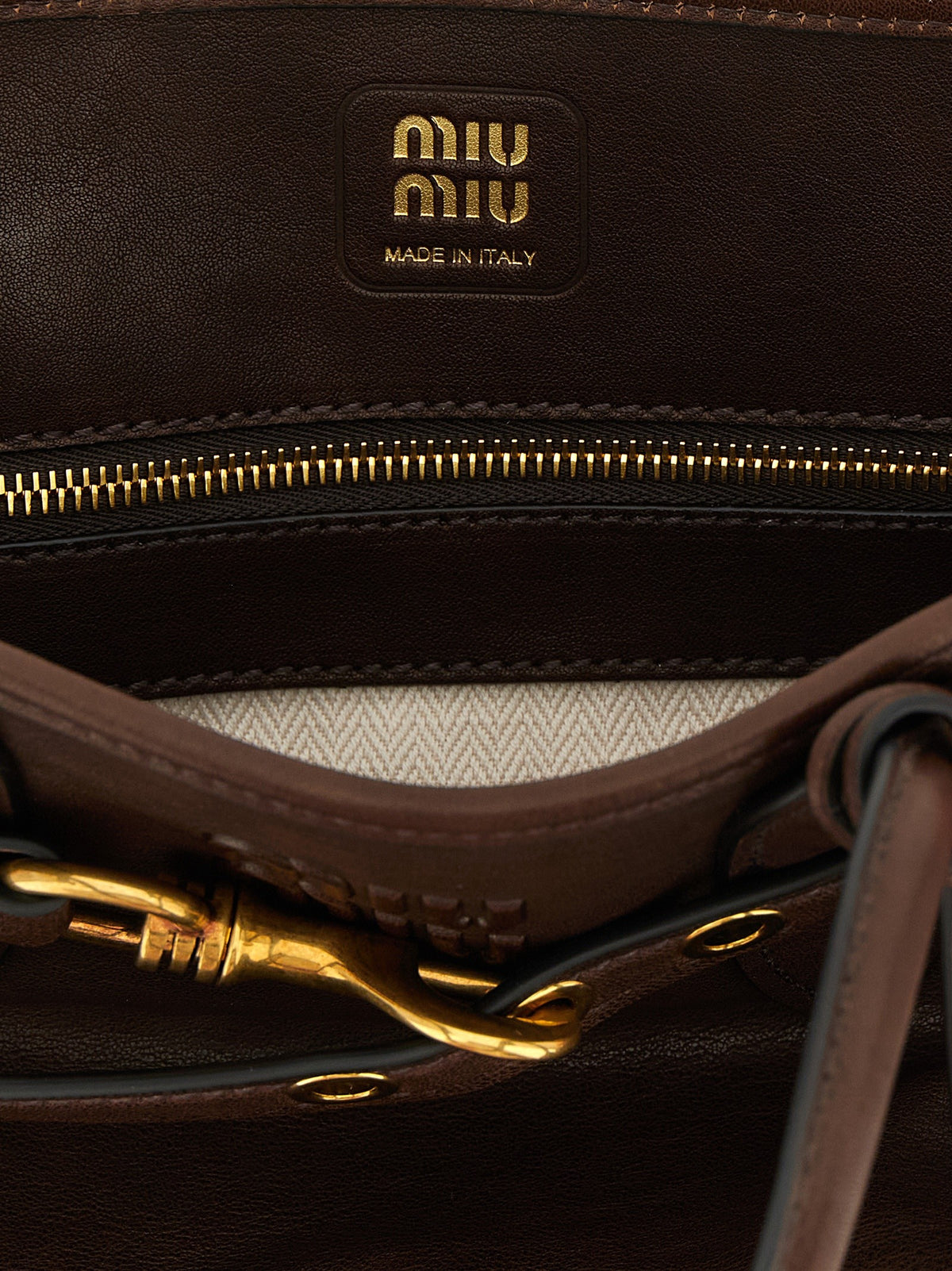Miu Miu - Aventure leather handbag with embossed lettering logo