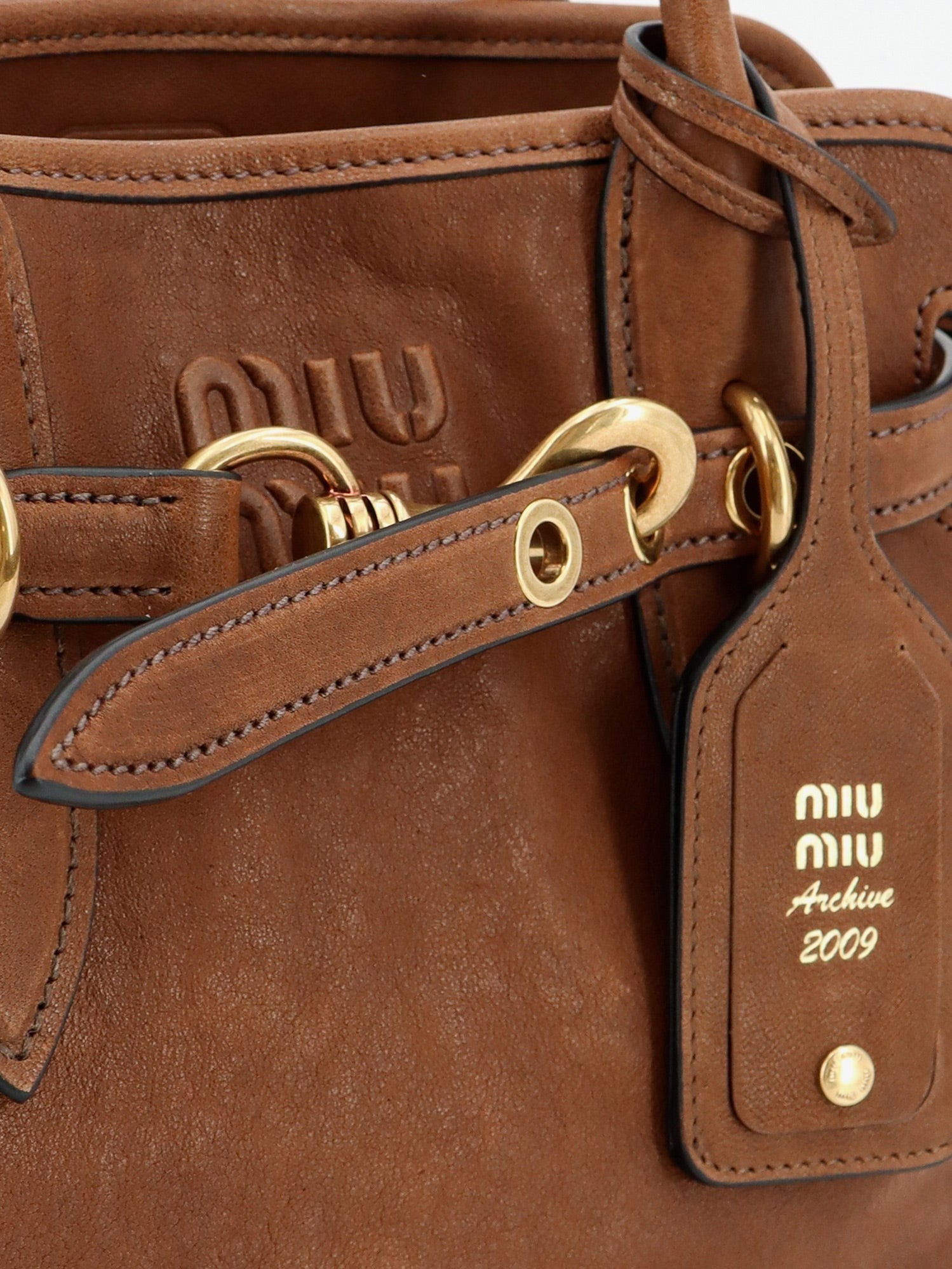 Miu Miu - Aventure leather handbag with embossed lettering logo