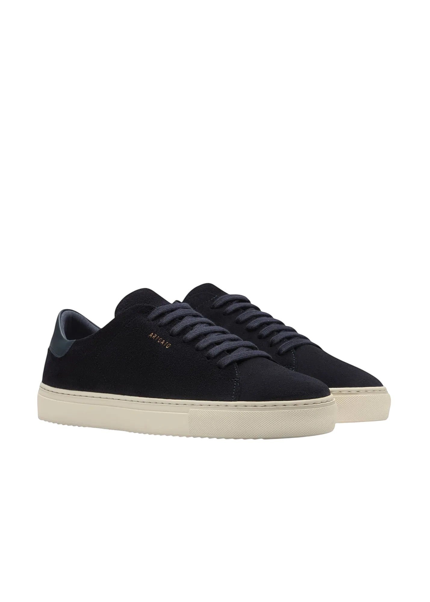 Axel Arigato Clean 90 navy suede sneakers with cream sole and navy laces.