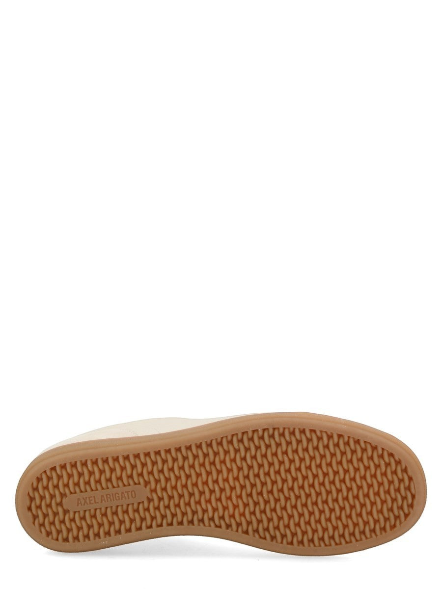 Outsole view of the AXEL ARIGATO Zane sneaker showing the textured translucent gum rubber sole.