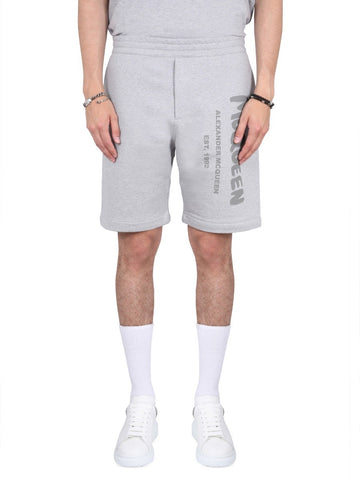 BERMUDA SHORTS WITH GRAFFITI LOGO PRINT