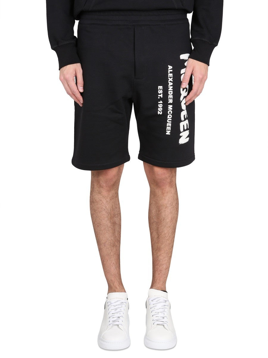 Alexander Mcqueen Alexander Mcqueen - BERMUDA SHORTS WITH GRAFFITI LOGO PRINT
