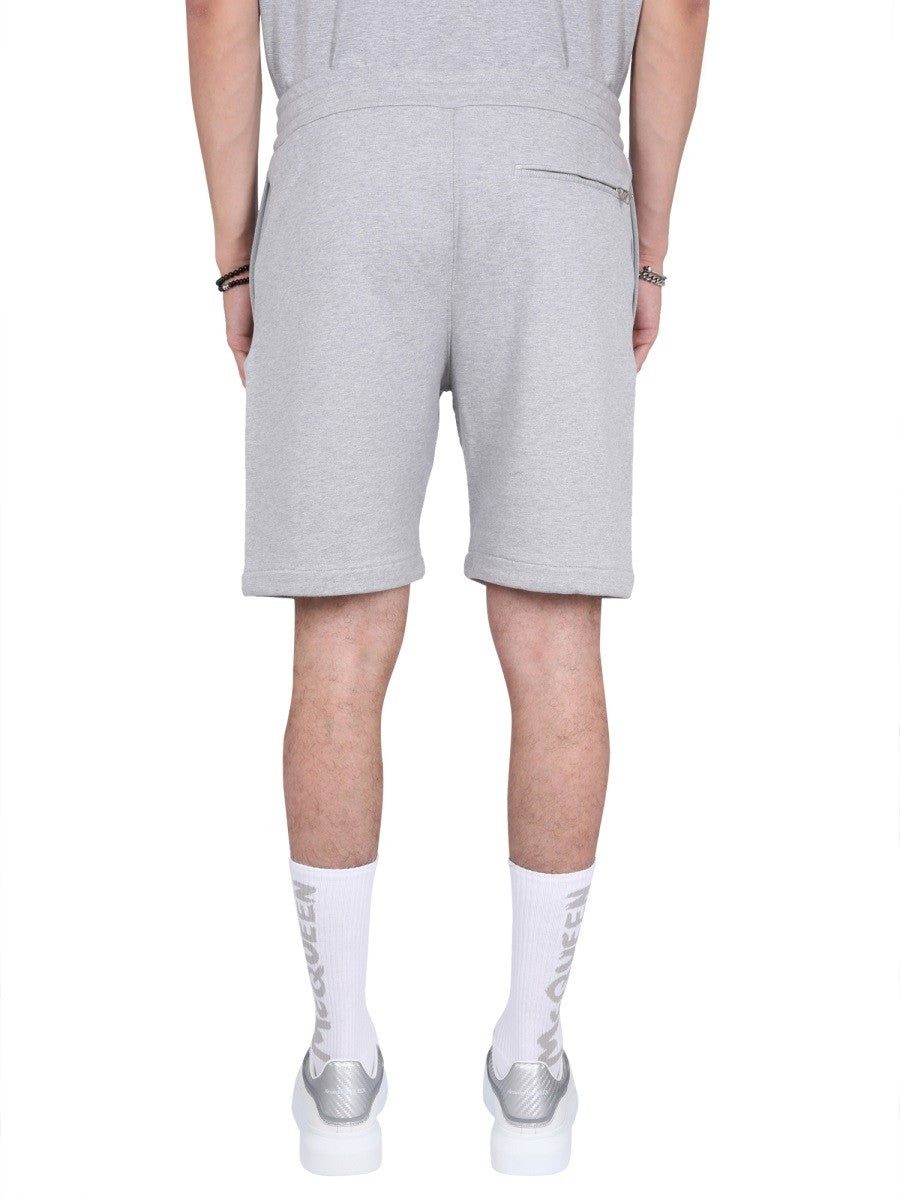 Alexander Mcqueen Alexander Mcqueen - BERMUDA SHORTS WITH GRAFFITI LOGO PRINT