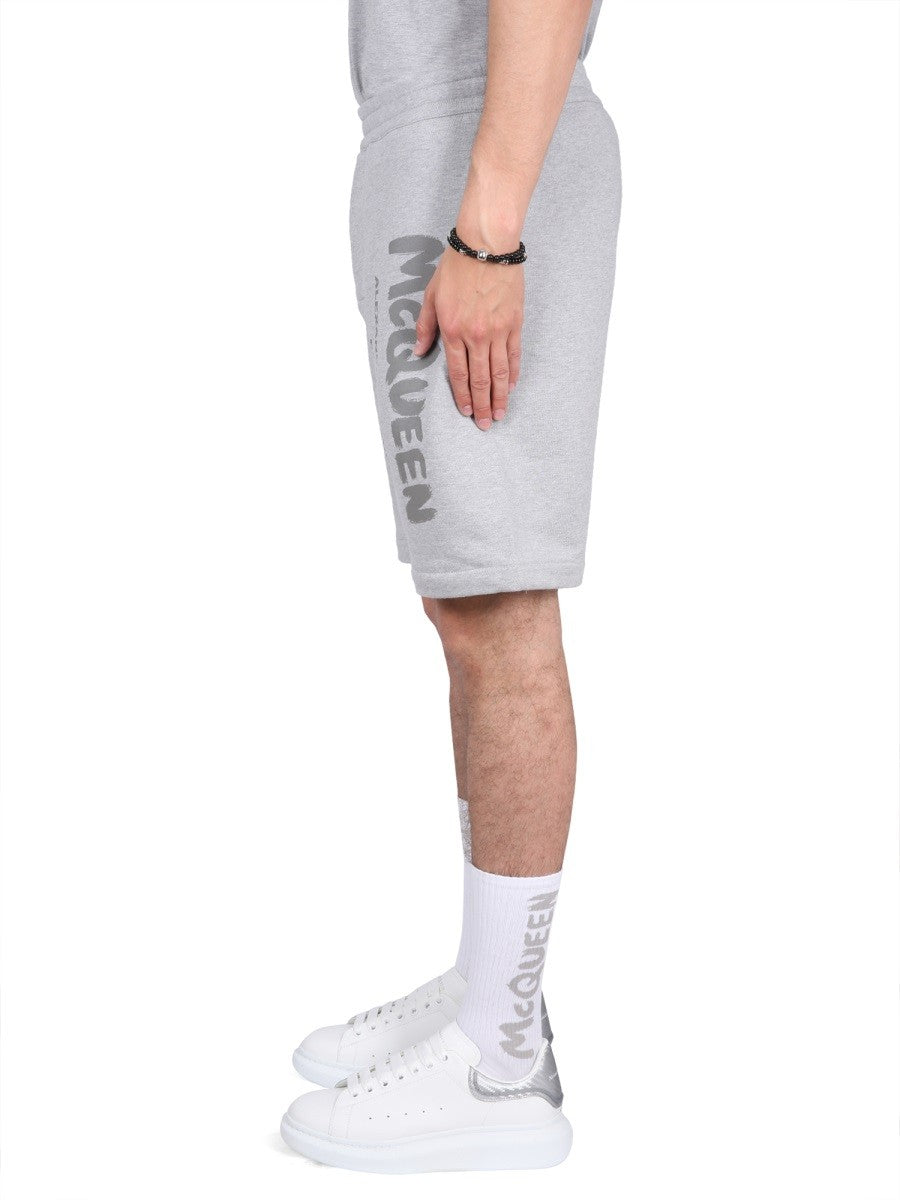 Alexander Mcqueen Alexander Mcqueen - BERMUDA SHORTS WITH GRAFFITI LOGO PRINT