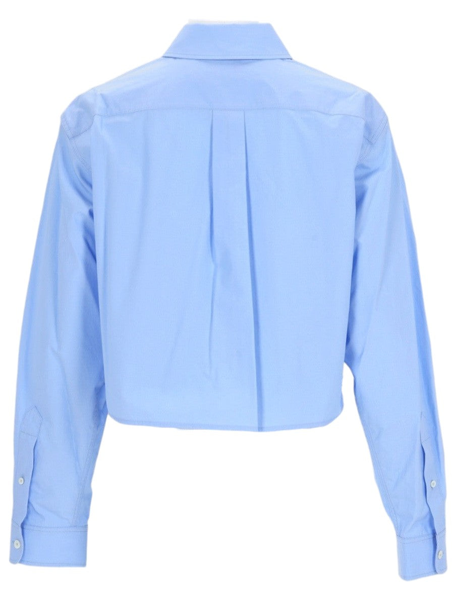 Alexander Wang Light blue shirt with white button and pocket for women