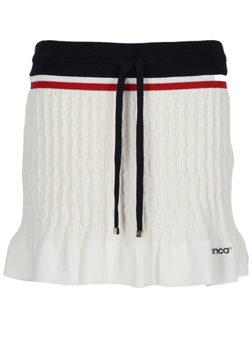 Front view of CASABLANCA white tennis mini skirt with drawstring waist, red stripe detail and small logo