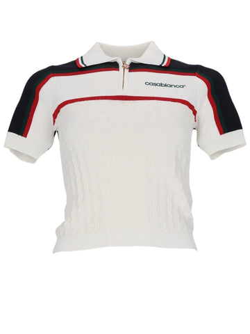 Front view of CASABLANCA white tennis polo knit top with zip collar, textured knit body and sporty contrast trims