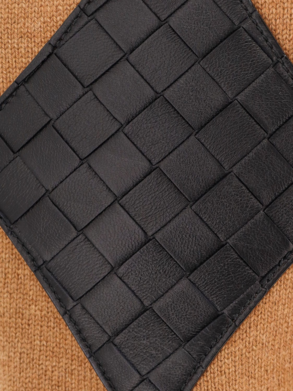 Cashmere cardigan with intrecciato iconic motif leather  details