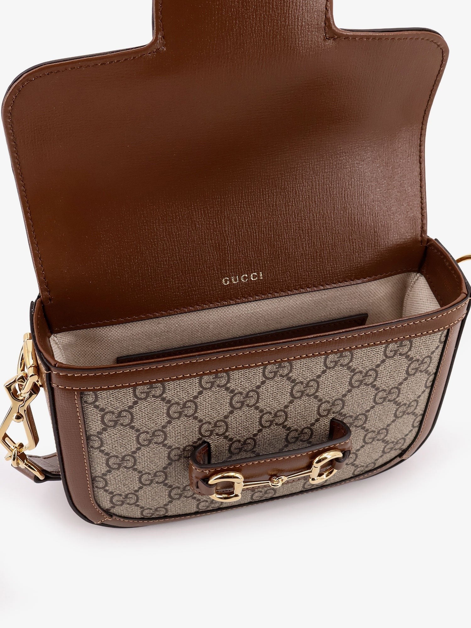 Gucci - Coated canvas Gucci Horsebit 1955 crossbody bag with GG Supreme motif