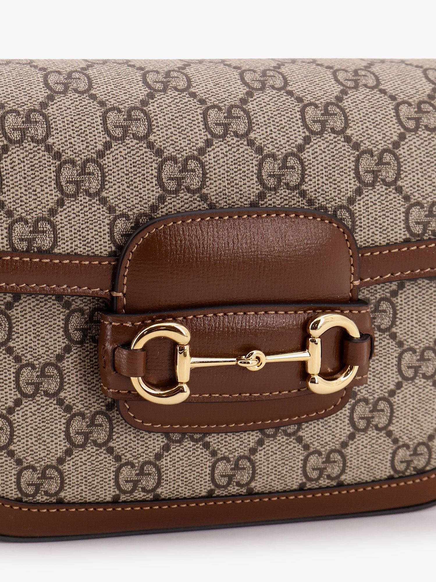 Gucci - Coated canvas Gucci Horsebit 1955 crossbody bag with GG Supreme motif