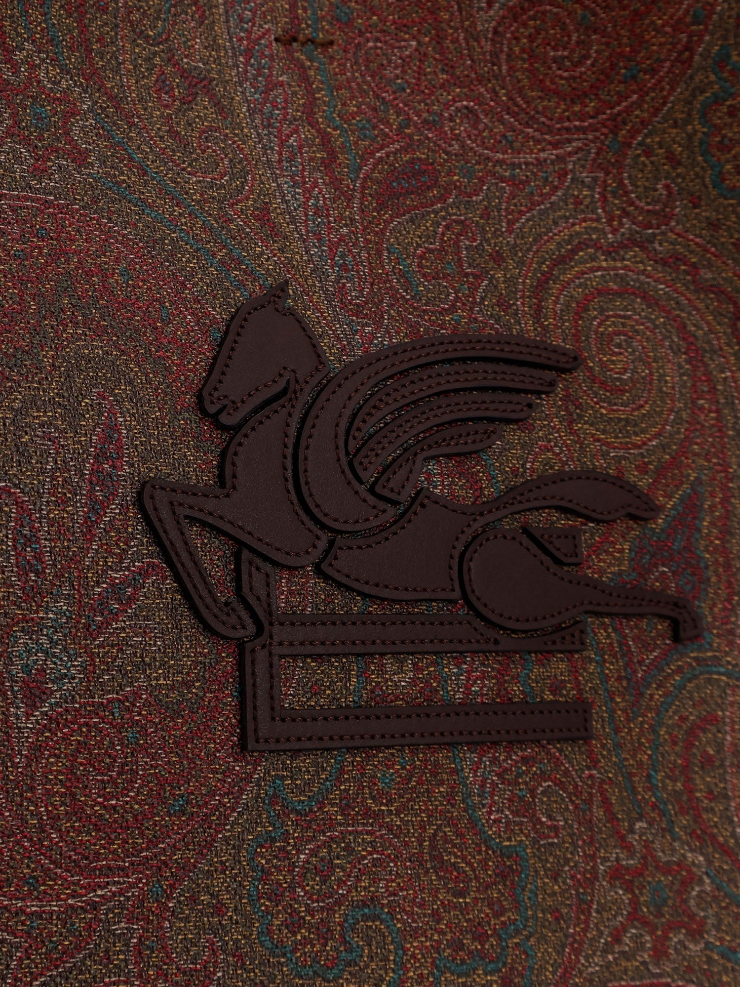 Coated canvas shoulder bag with paisley jacquard pattern