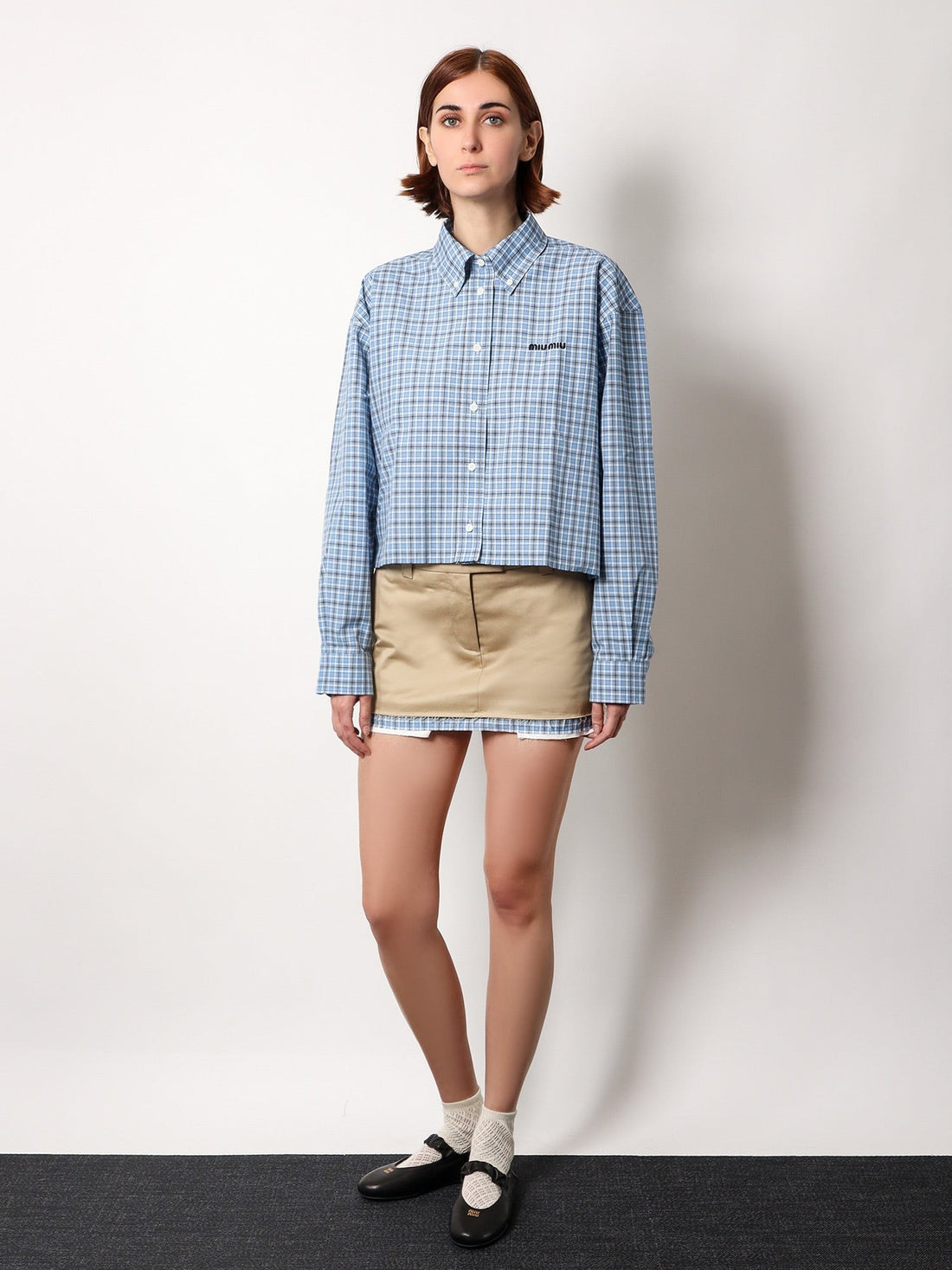 Cotton skirt with check insert on the bottom