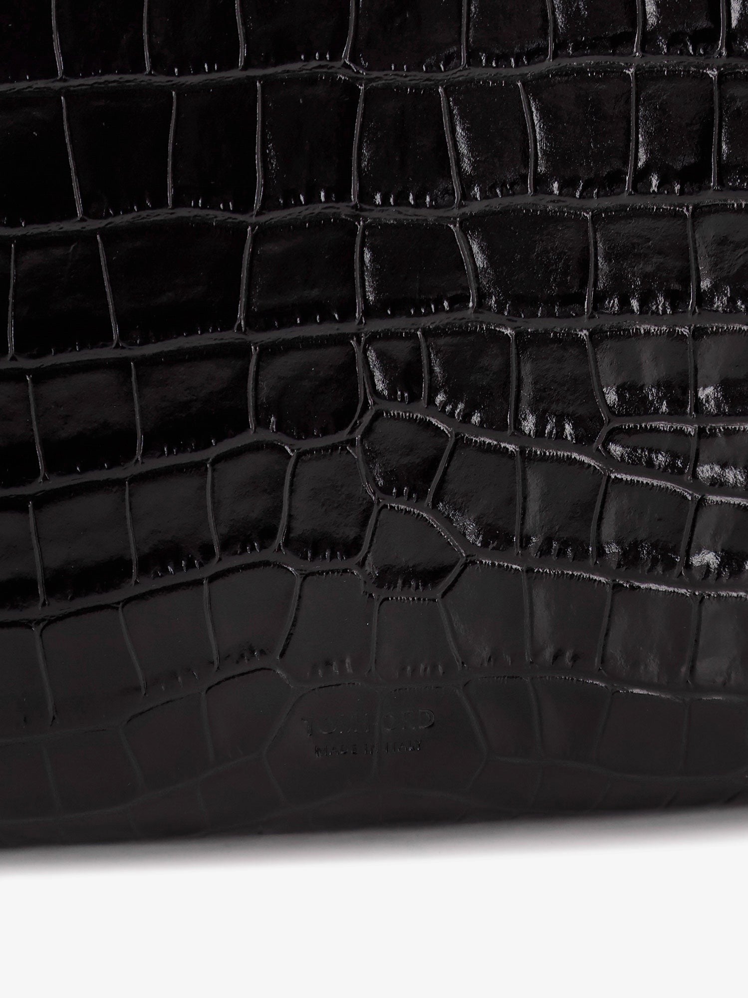 Crocodile-print leather clutch bag