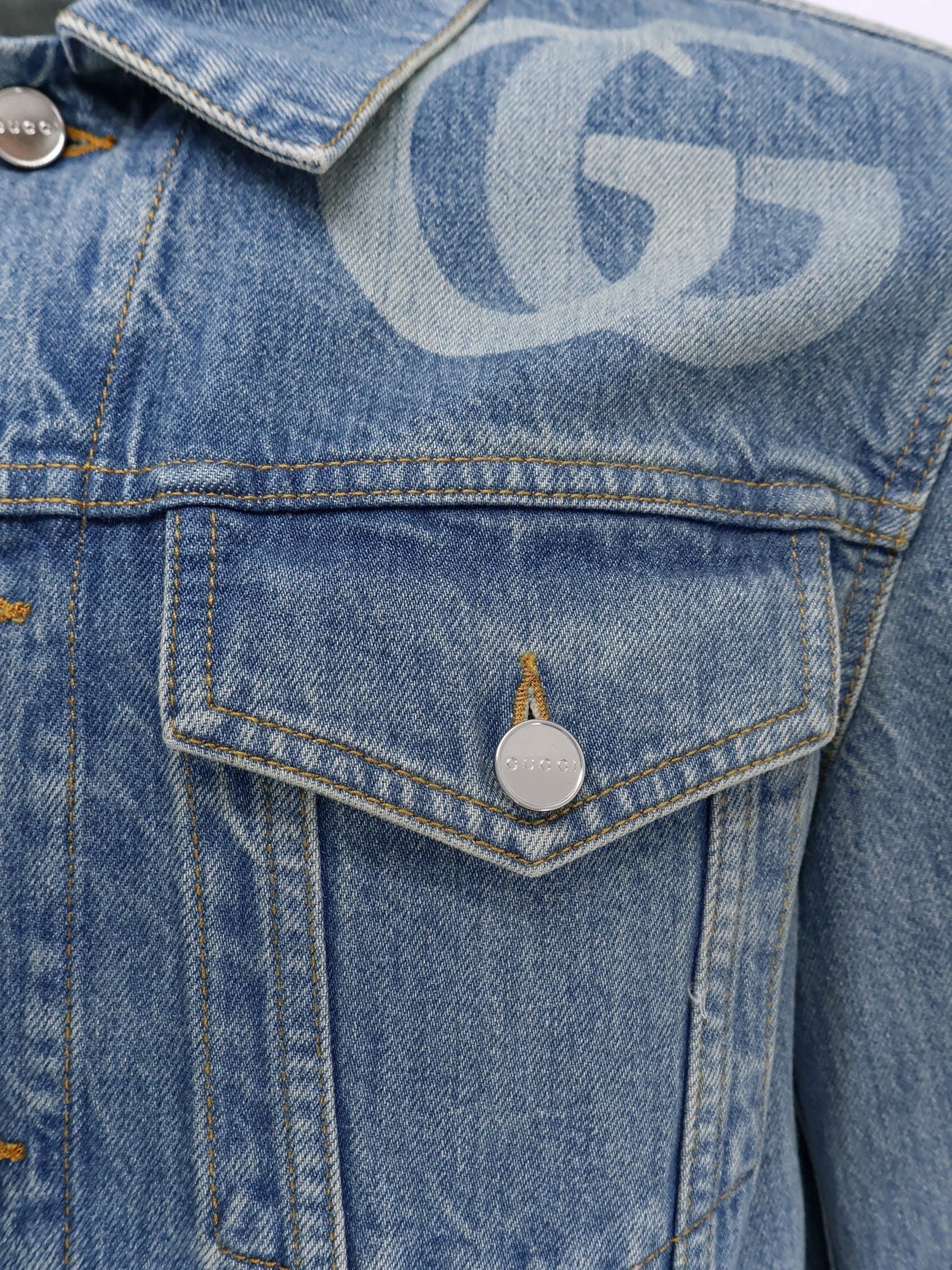 Denim jacket with lasered double g
