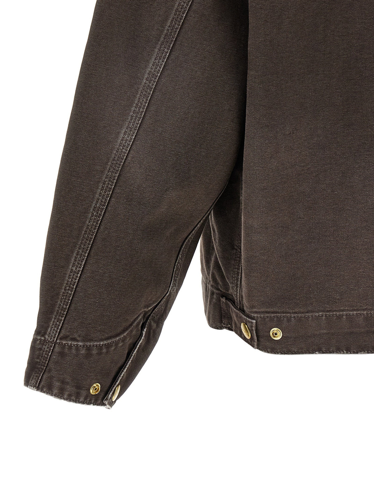 Carhartt WIP Brown Detroit Jacket — Close-up details of the adjustable cuff and rear hem.