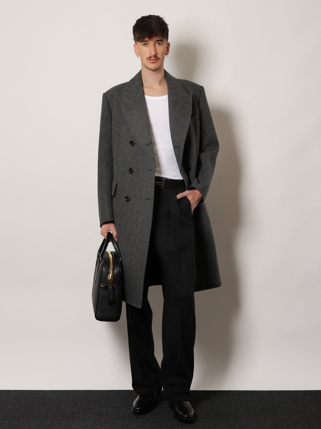 Double-breasted wool coat with herringbone motif
